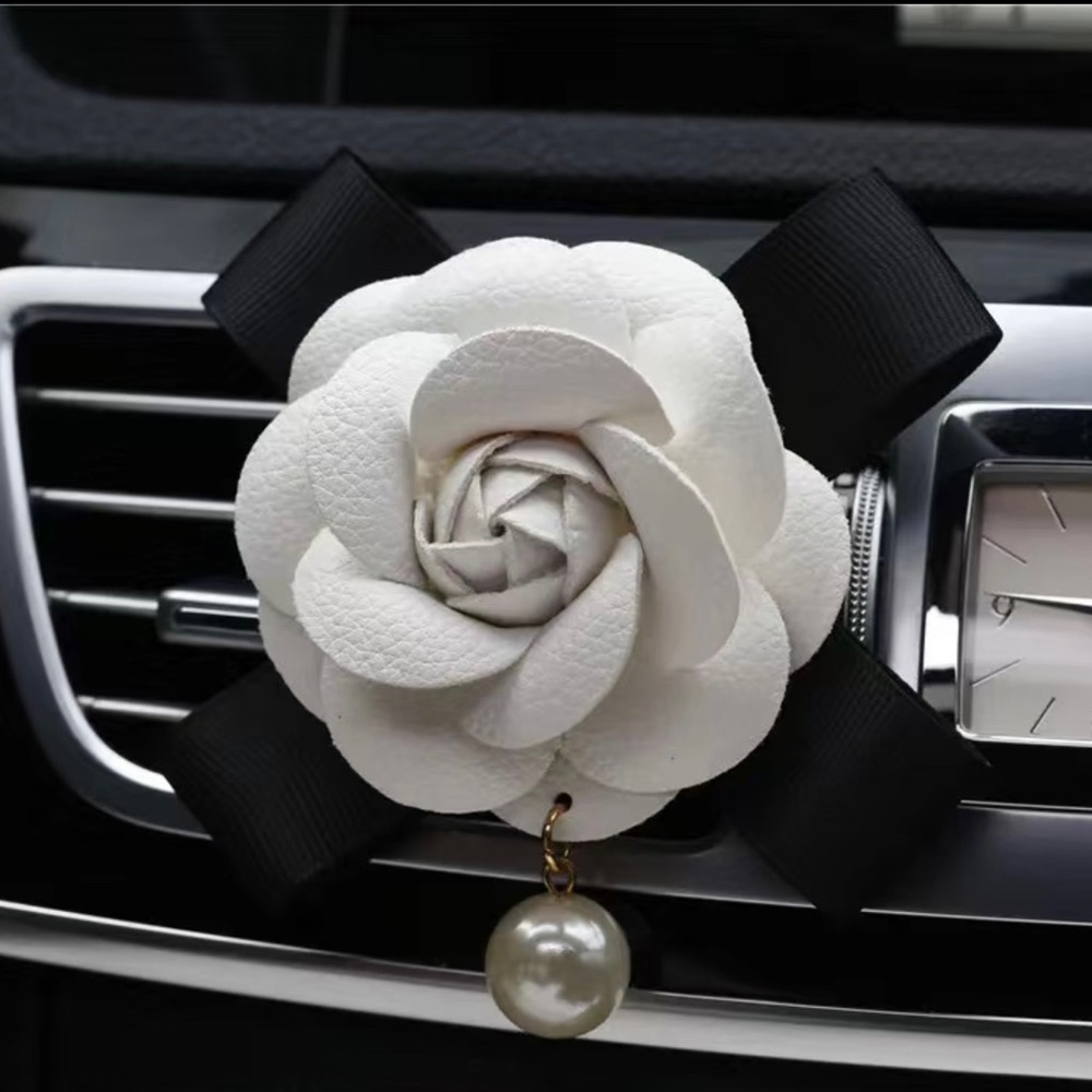 White Camellia and black bow car air freshener